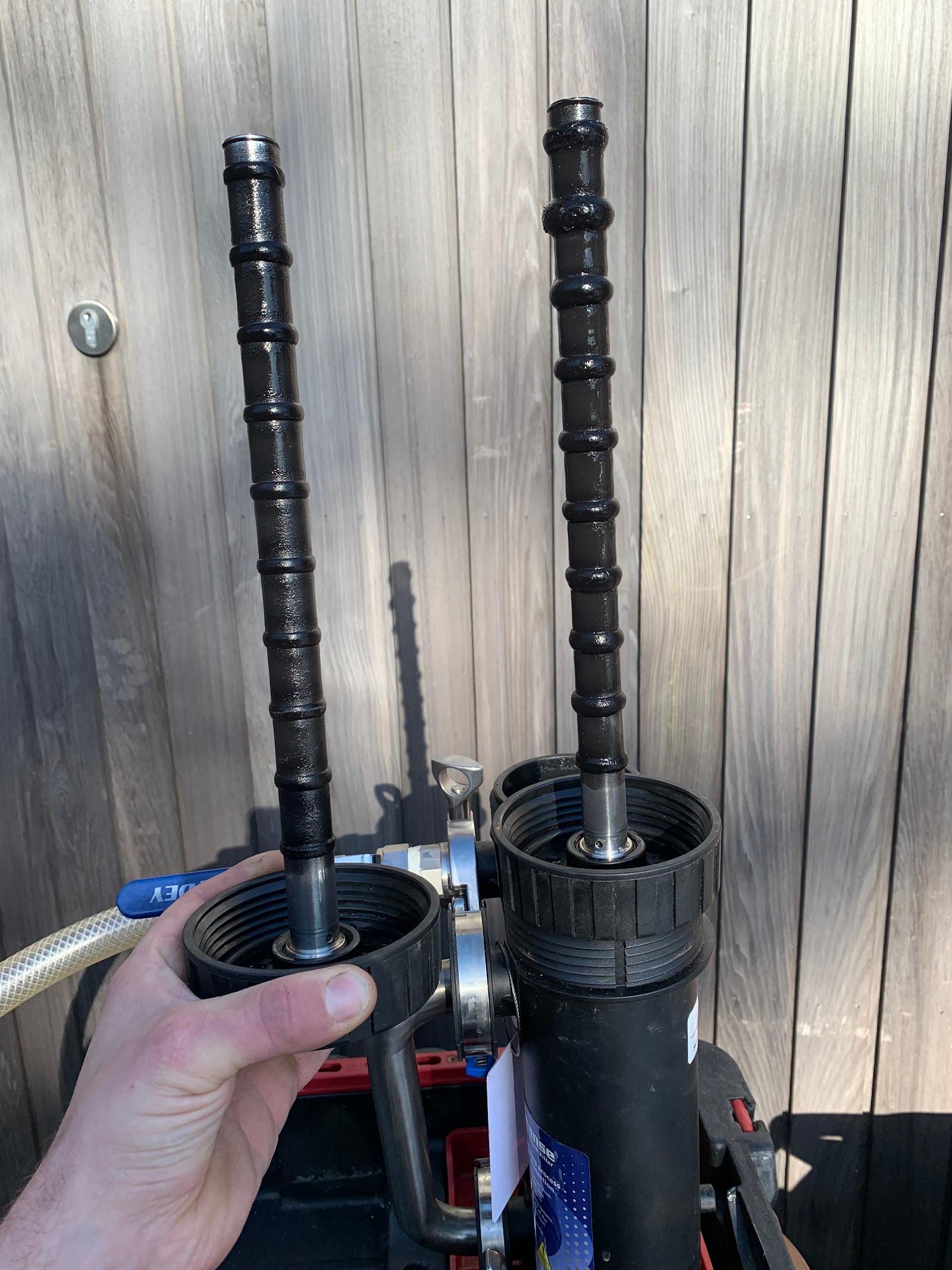 A magnetic filter opened up for cleaning during a boiler service